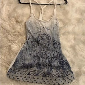 Small tank top with cross crossed back.